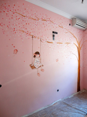 mural arbol con flores y niña para dormitorio infantil
